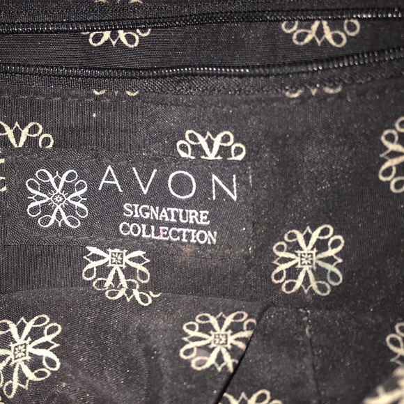 Black with gold tone hardware and faux leopard fur accents. Purse - Picture 5 of 5